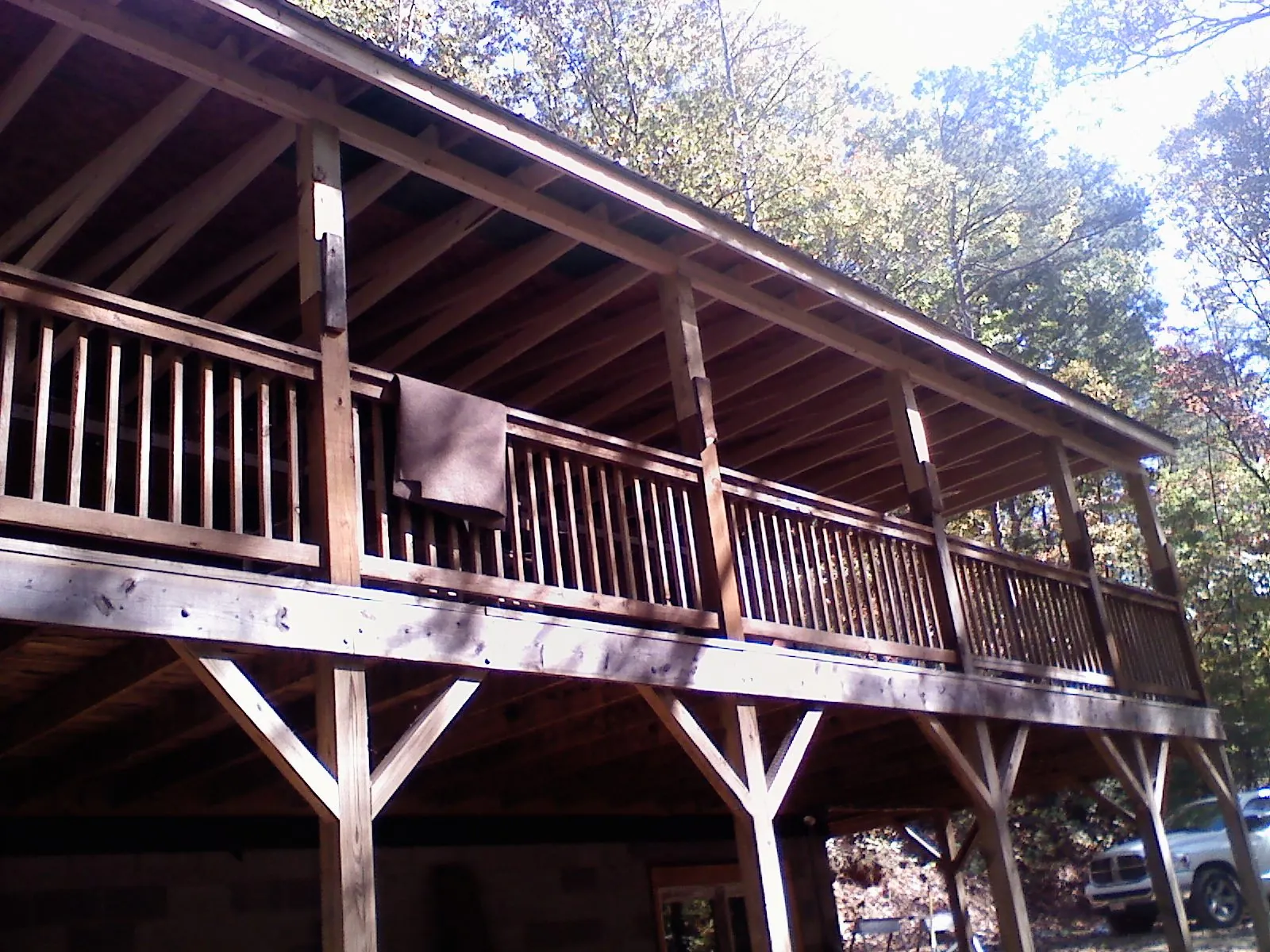 Timber framing under a new elevated porch and deck — Roof Leak Repair in Sarver by Roofing Brothers